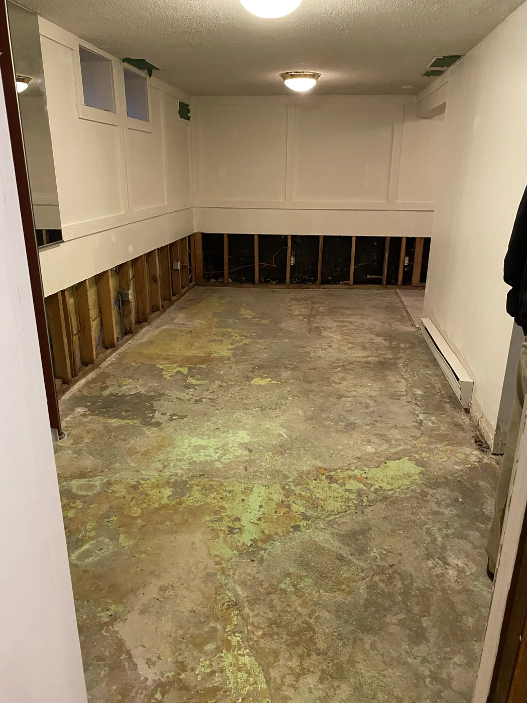 Room after water-damaged drywall removal